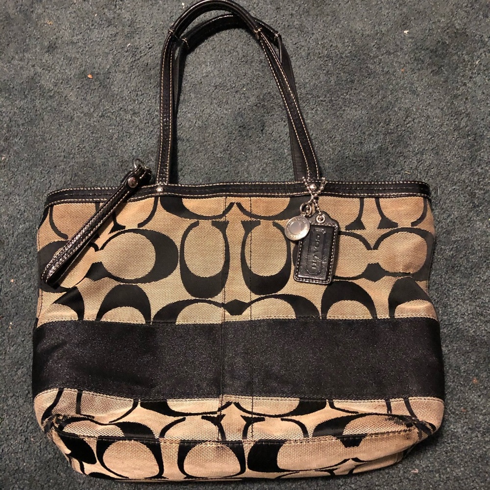 Grey and black Coach purse